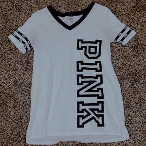 Size small black and white shirt from “Pink”.